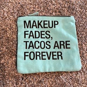Makeup fades, tacos are forever zipping makeup bag